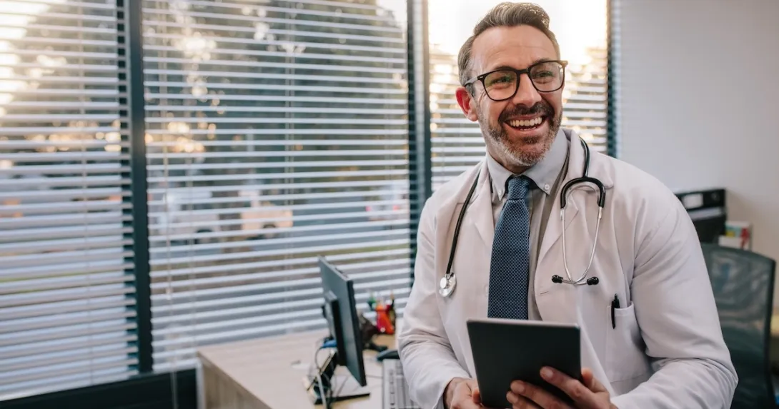 Physician holding a stethoscope and a tablet computer
Physician holding a stethoscope and a tablet computer