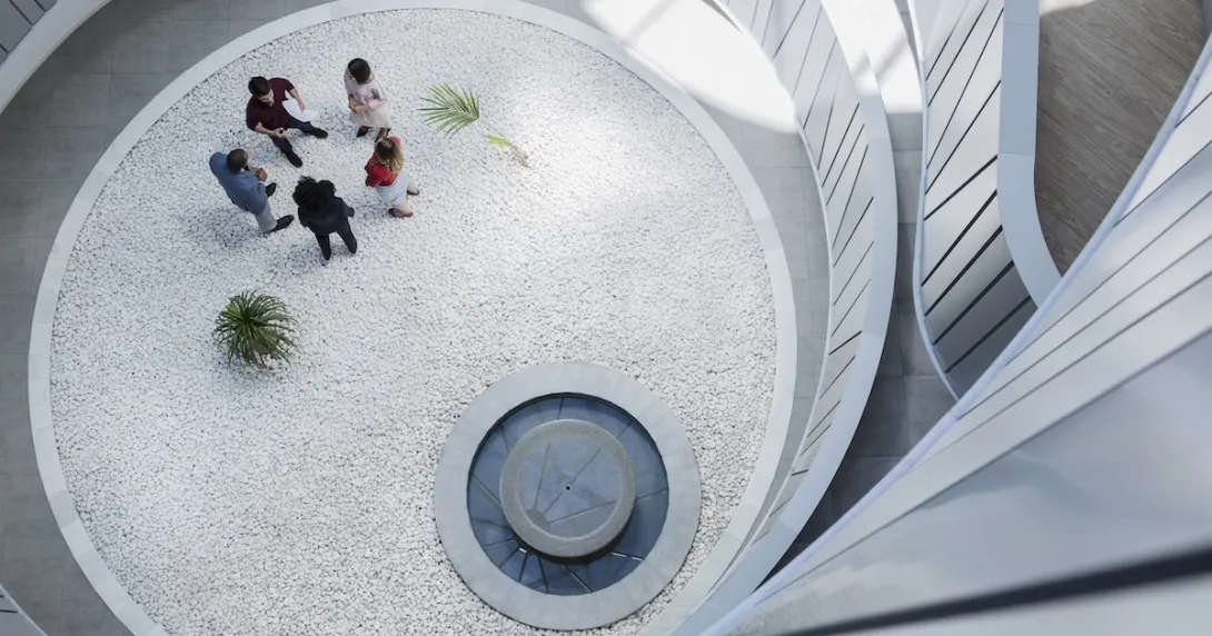 Employees gathering in an atrium
Employees gathering in an atrium