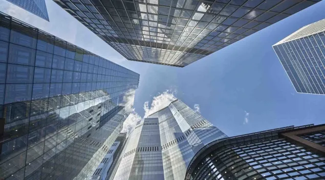 
  Photo looking up at the top of skyscrapers
