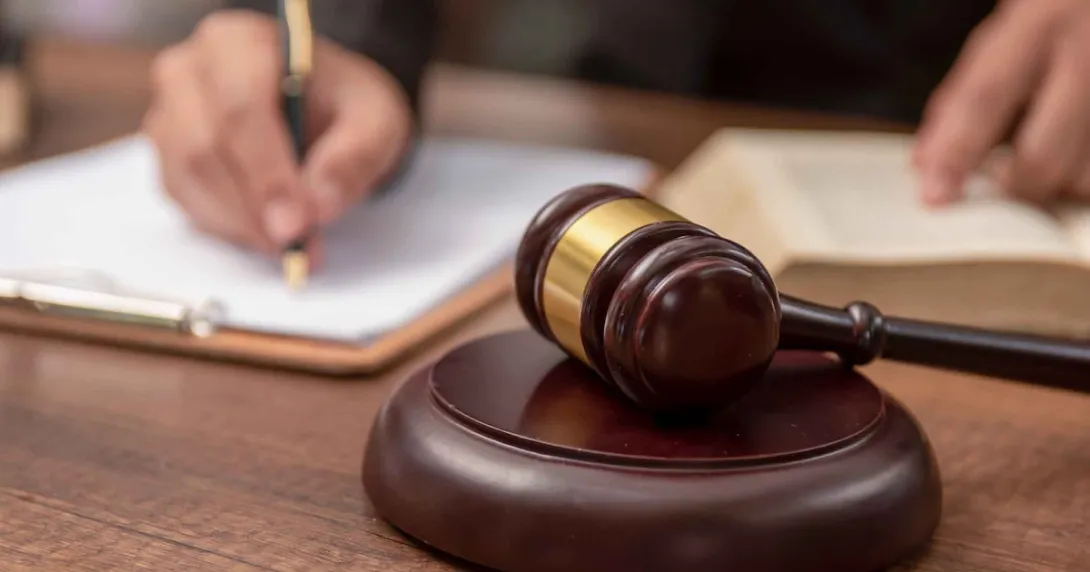 Lawyer with contract and gavel