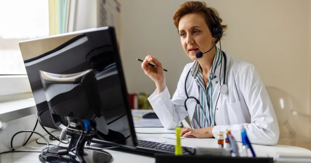 Healthcare professional interacting with a patient virtually