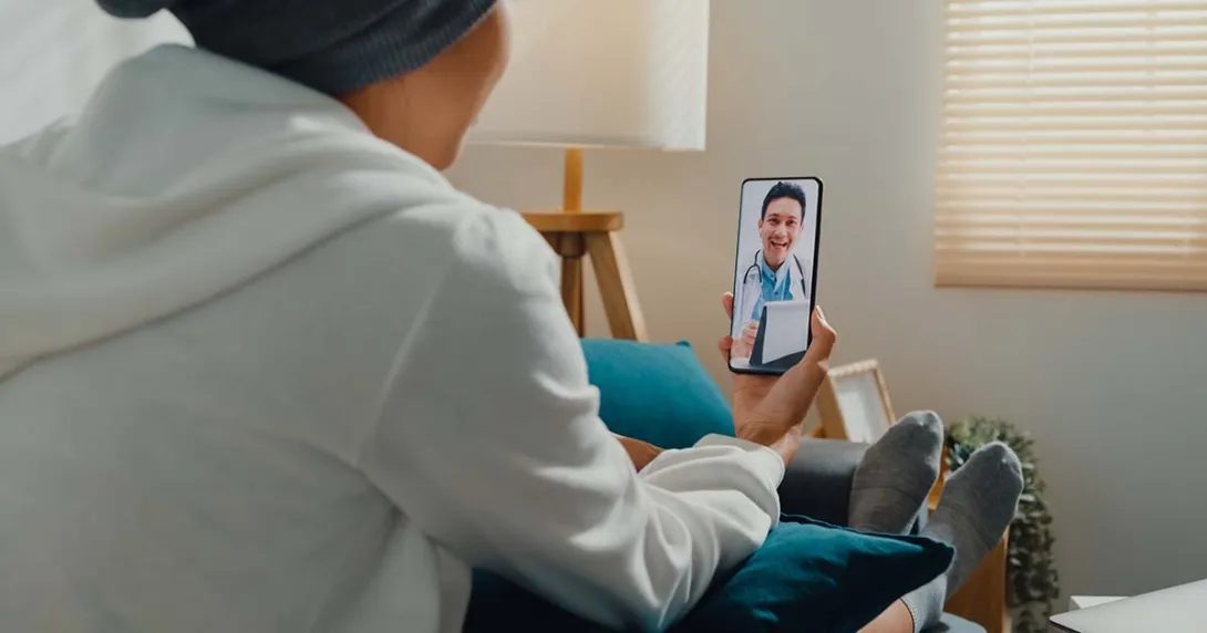 Person talking on the phone with a healthcare provider