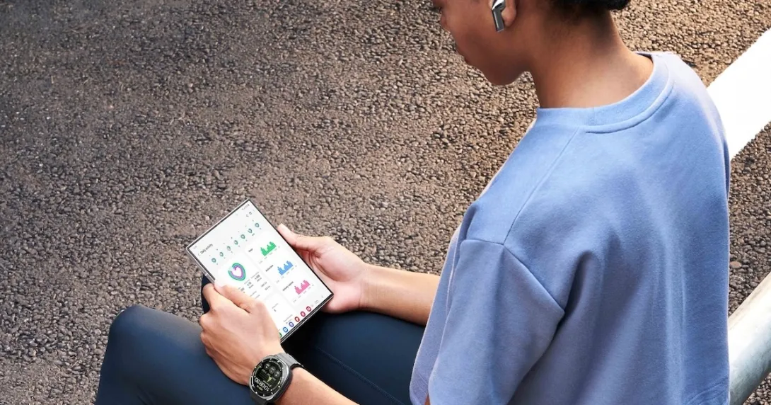Person wearing a Samsung Galaxy Watch and looking at Samsung's Health App