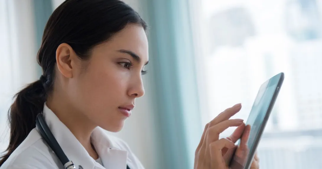 Healthcare provider on a tablet
