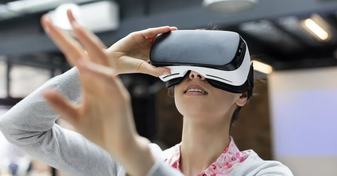 Woman looking into virtual reality glasses