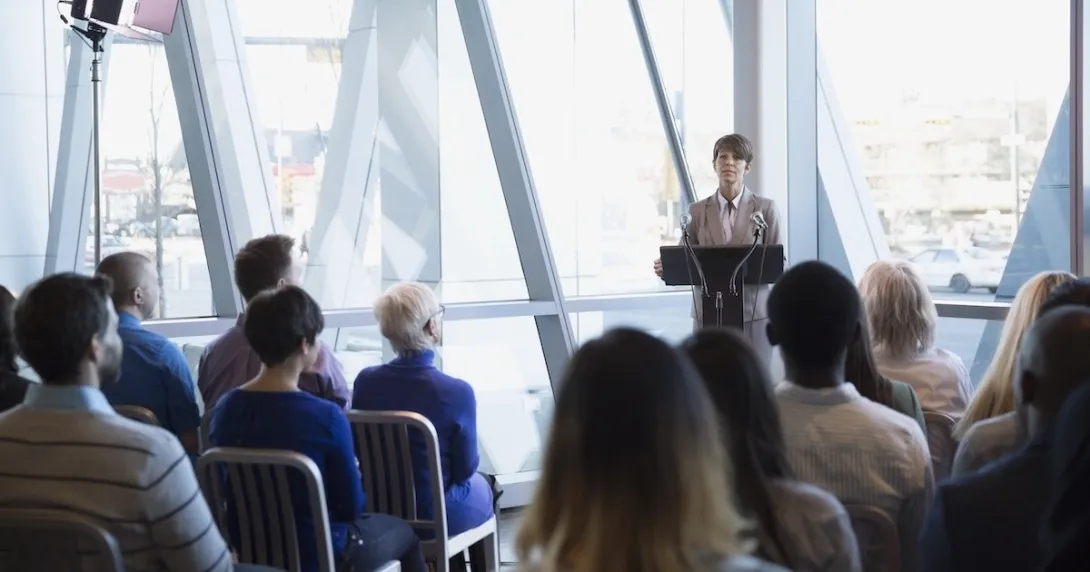 Person addressing business meeting