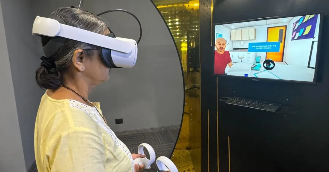 A nurse trying out a VR simulator at the Virtual Reality Health Lab in KD Hospital
