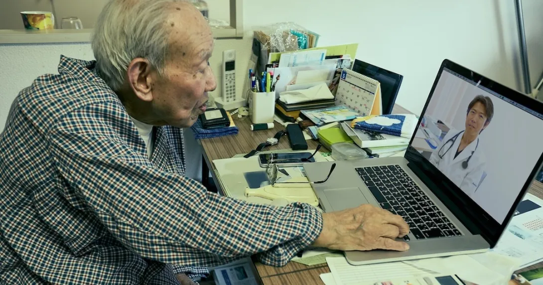 Person interacting with a healthcare professional via a telehealth visit