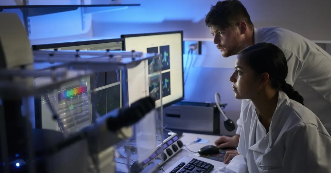 Healthcare professionals reviewing imaging on a PC