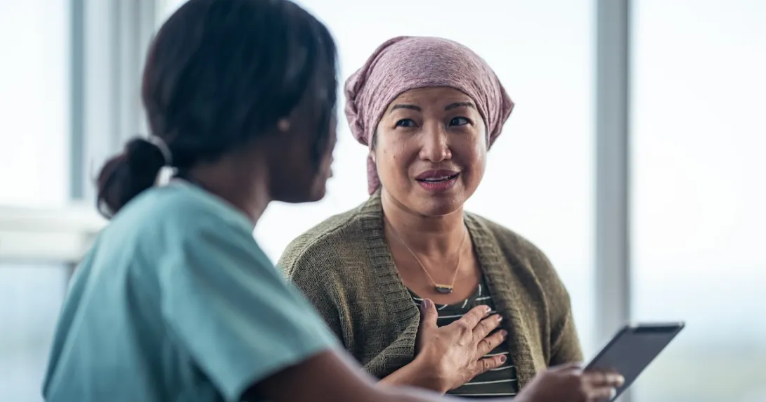 Healthcare professional consulting with patient