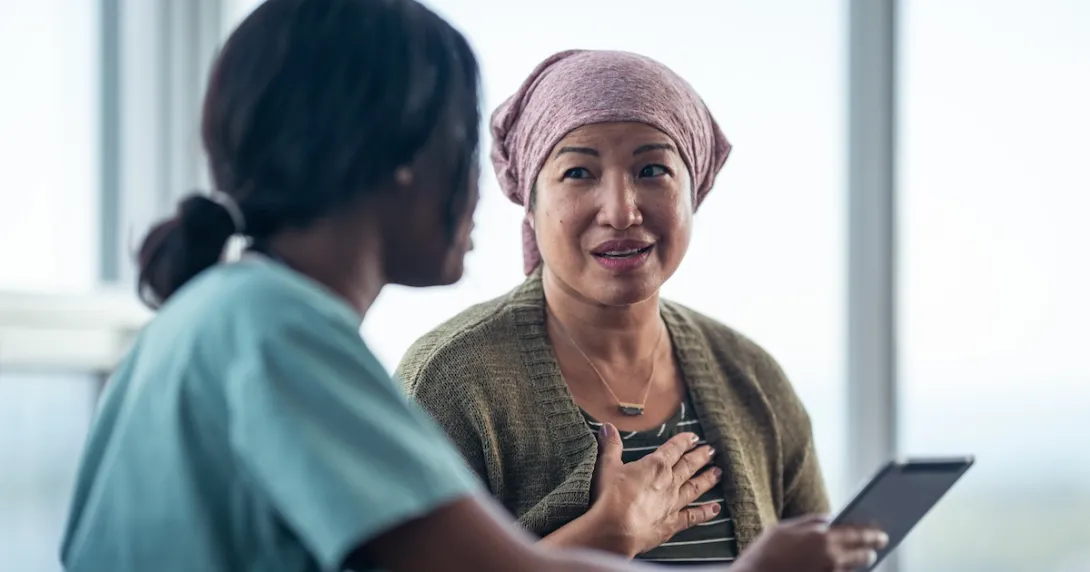 Healthcare professional consulting with a patient