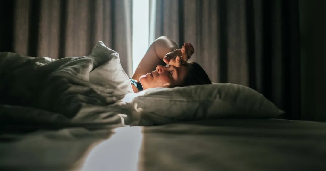 Person lying in bed