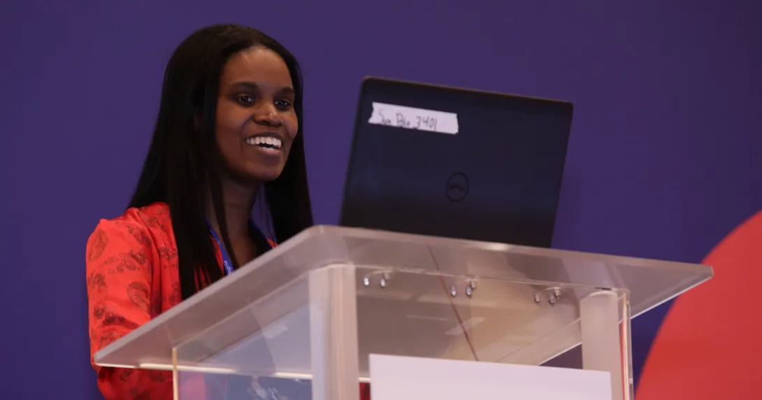Dr. Yaa Kumah-Crystal speaks at a podium at HIMSS21.