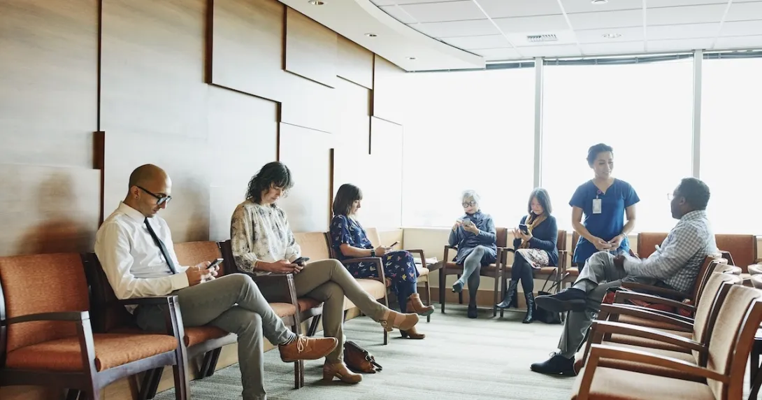 Patients sitting in a waiting room