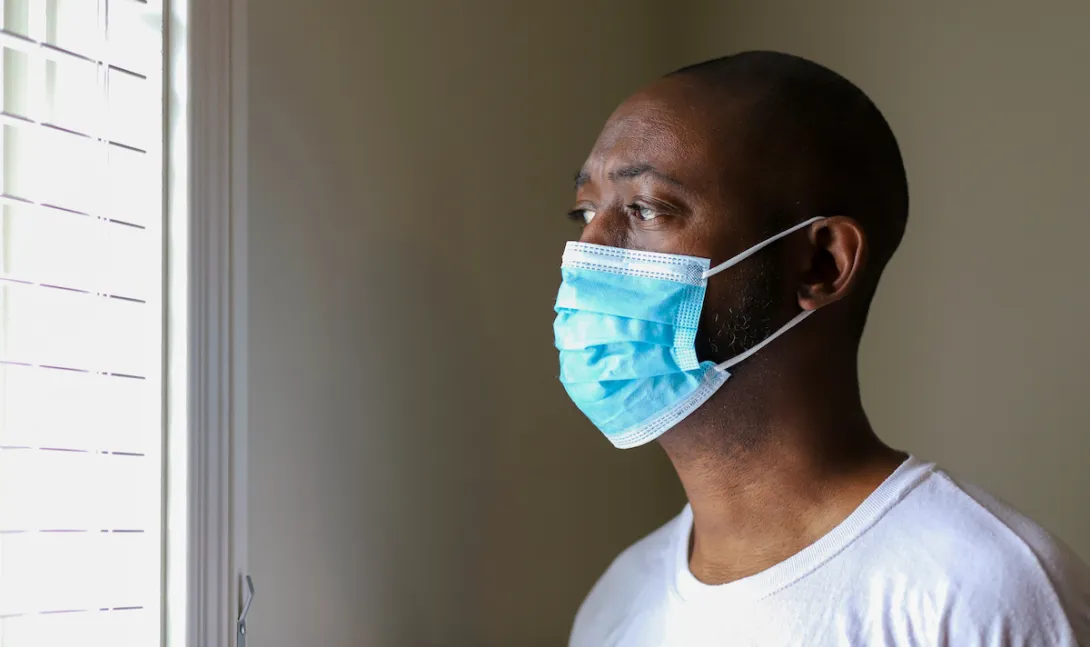 Person wears a mask
