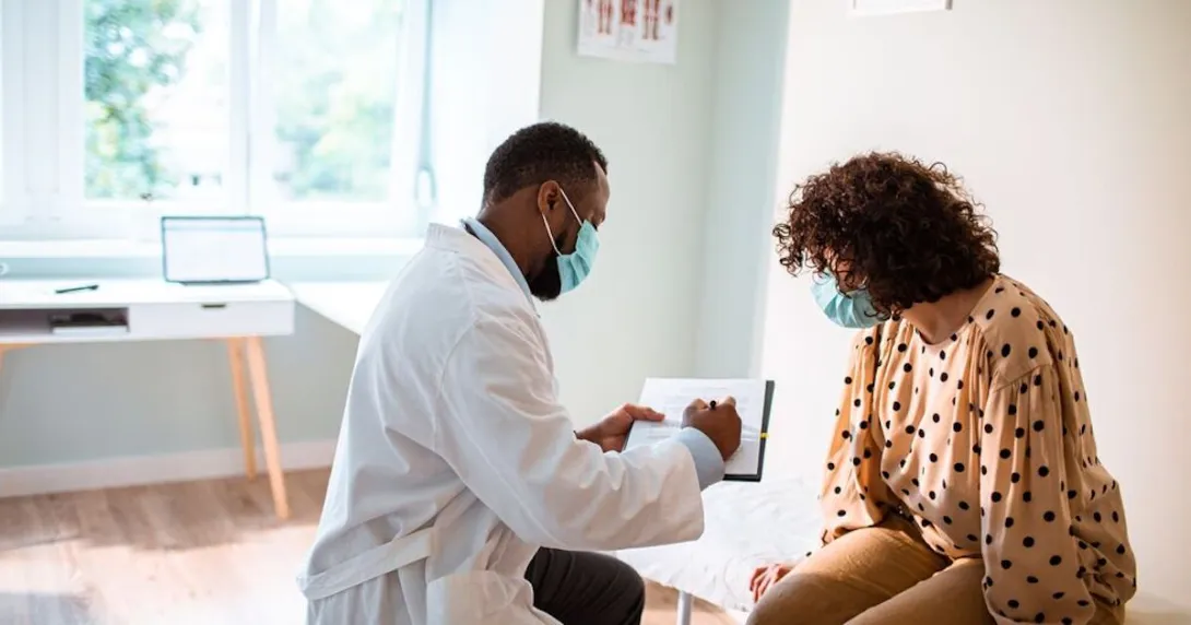Doctor talks to patient