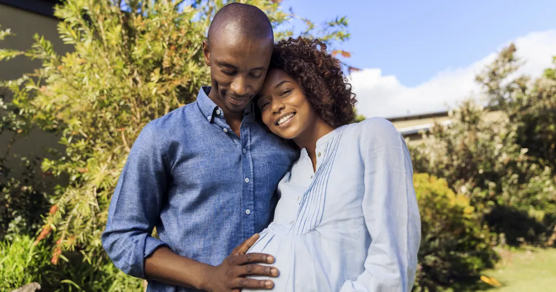 A pregnant person with partner