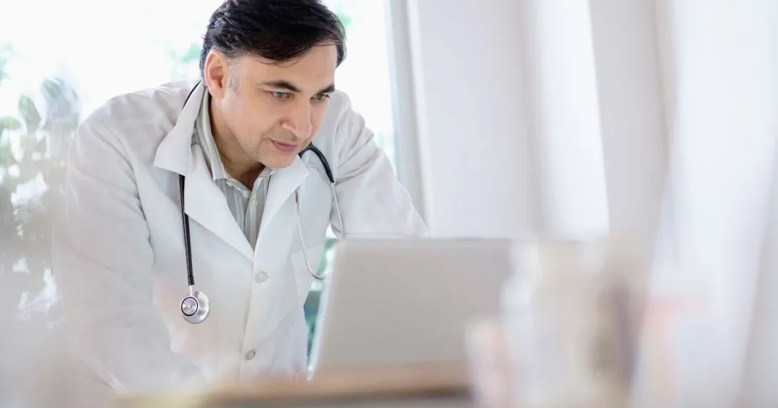 Healthcare provider on a computer