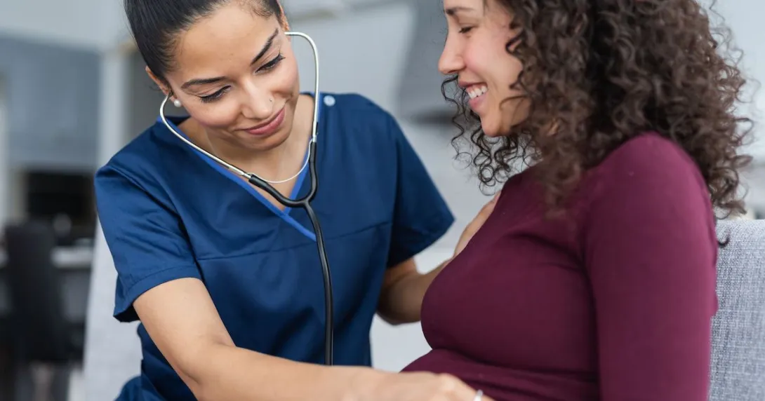 Healthcare provider helping a patient