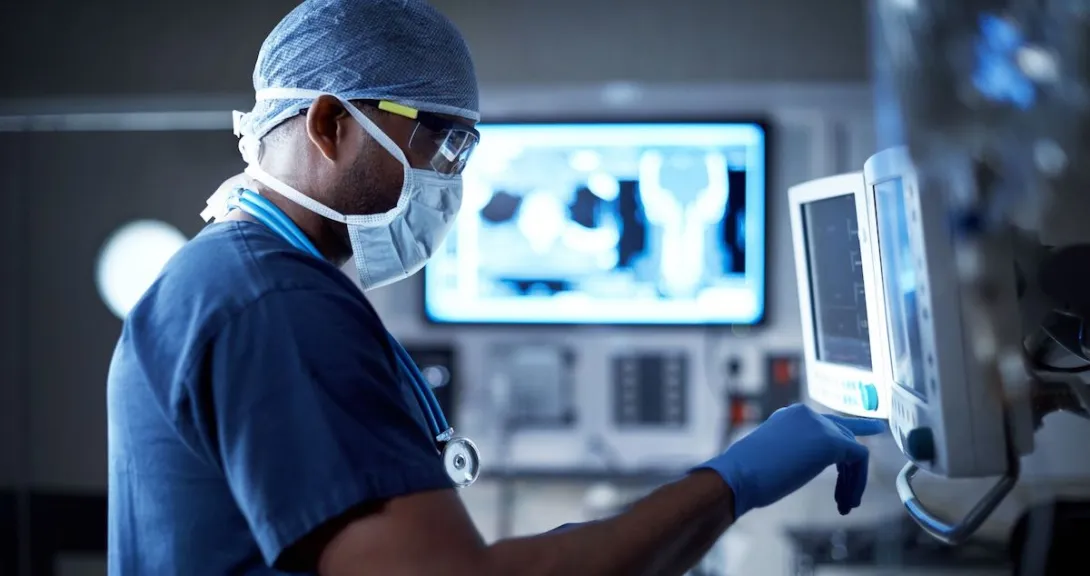 Healthcare provider looking at screens
