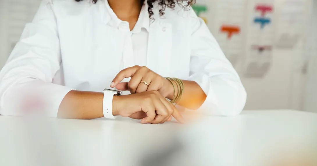 A person looking at their smartwatch